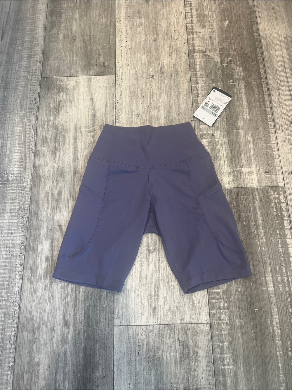 Nike Womens’s One High-Waisted 8” Biker Short with pockets Size XS Purple